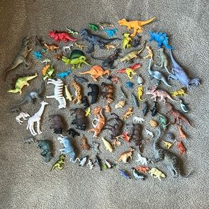 Animal and dinosaur figurines.